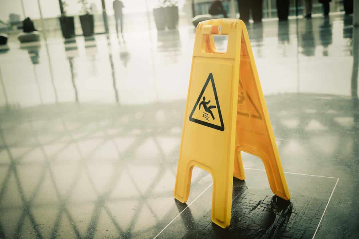 Yellow slippery warning sign